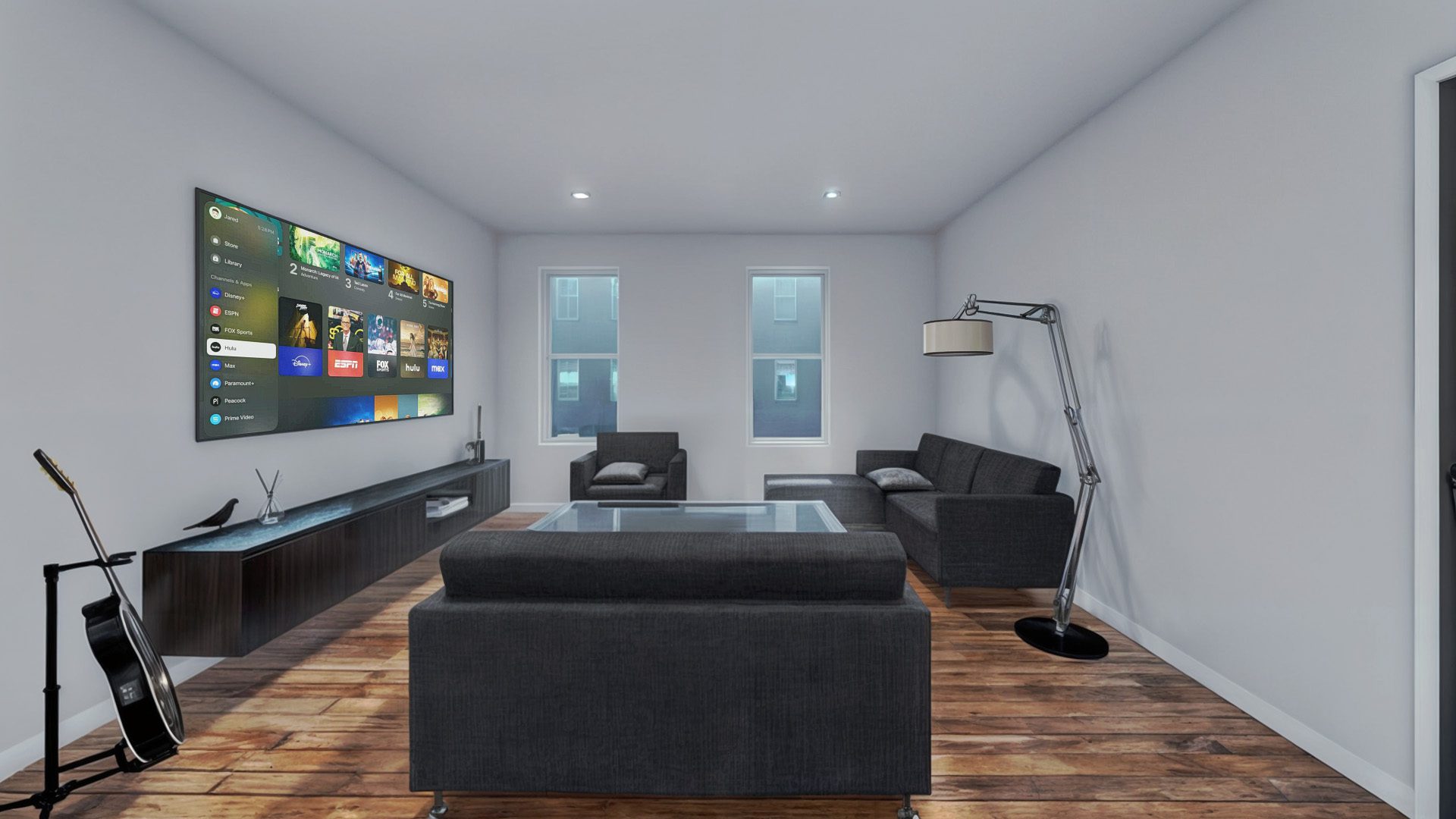 S202AF Modern living room with wooden flooring, grey sofas, a wall-mounted TV, a floor lamp, a glass coffee table, and large windows. A guitar rests on a stand near the TV.